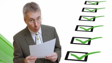 Impressed employer looking at a resume that checks all the boxes