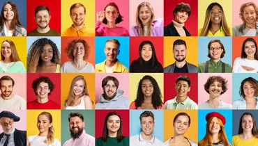 Smiling people. Group of diverse men and women posing and expressing positive emotion over multicolored background. Concept of human emotions, youth, lifestyle, business, job fairs 