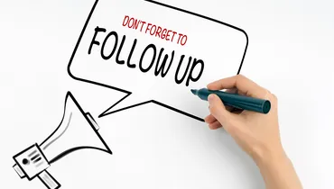 Don`t Forget to Follow Up. Megaphone and text on a white background.