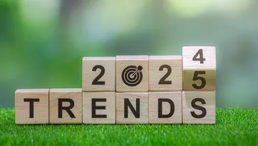 wooden blocks stacked up that spell out 2024/2025 trends